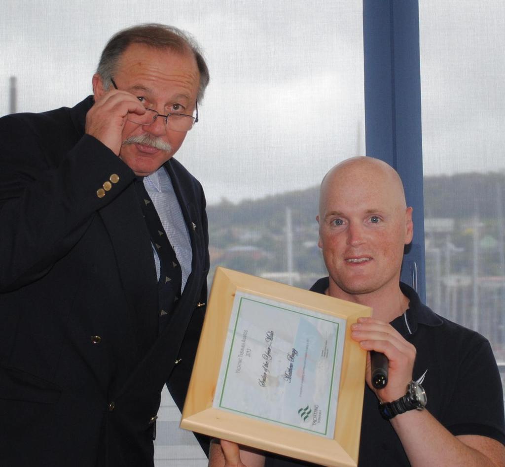 Tasmanian Sailor of the Year Matt Bugg receives his award from Yachting Tasmania president Ed Vincent © Peter Campbell